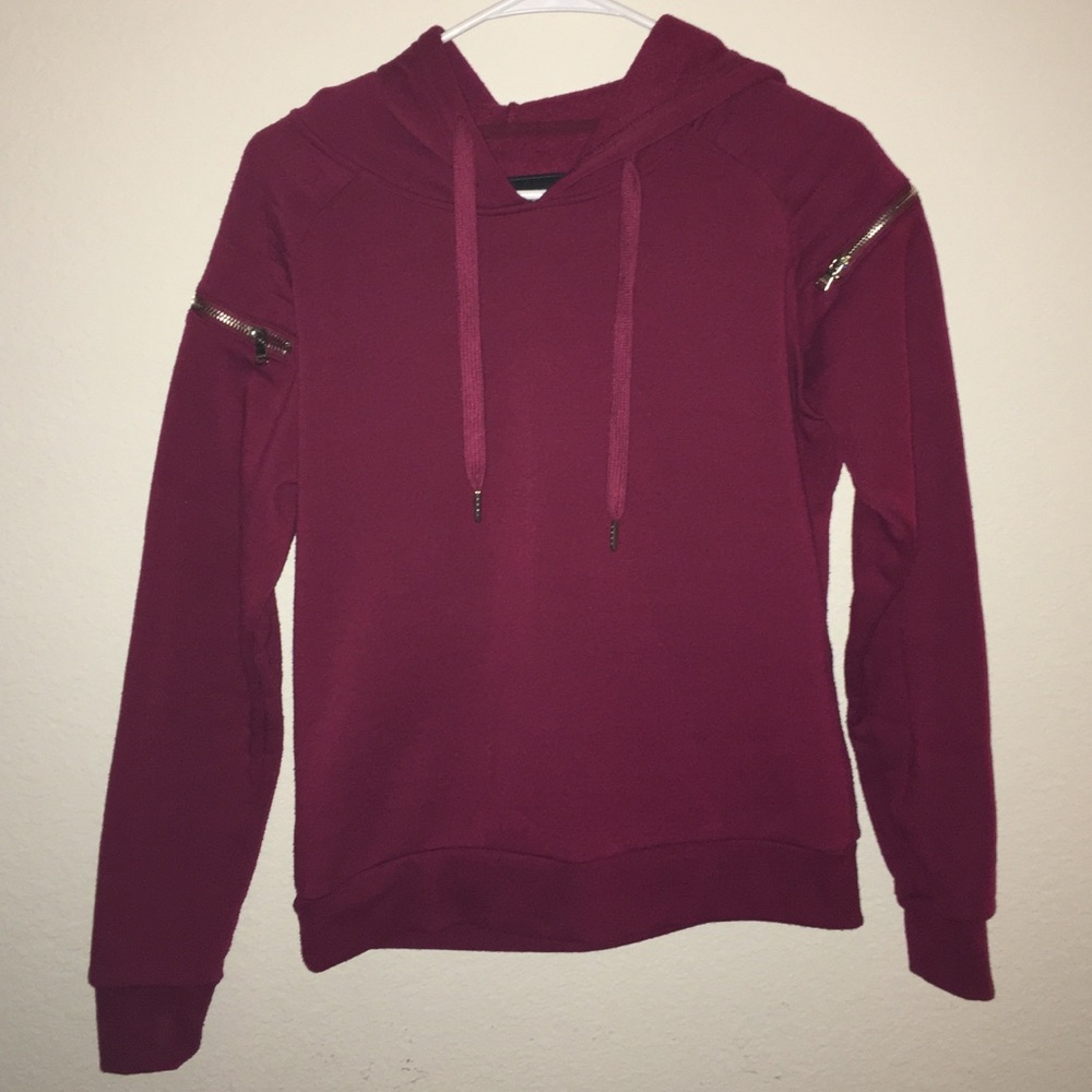 A Red Fox velvet color sweater